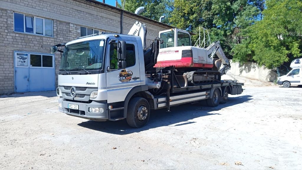 Transport excavator Takeuchi pe platforma camionului ITA.MD
